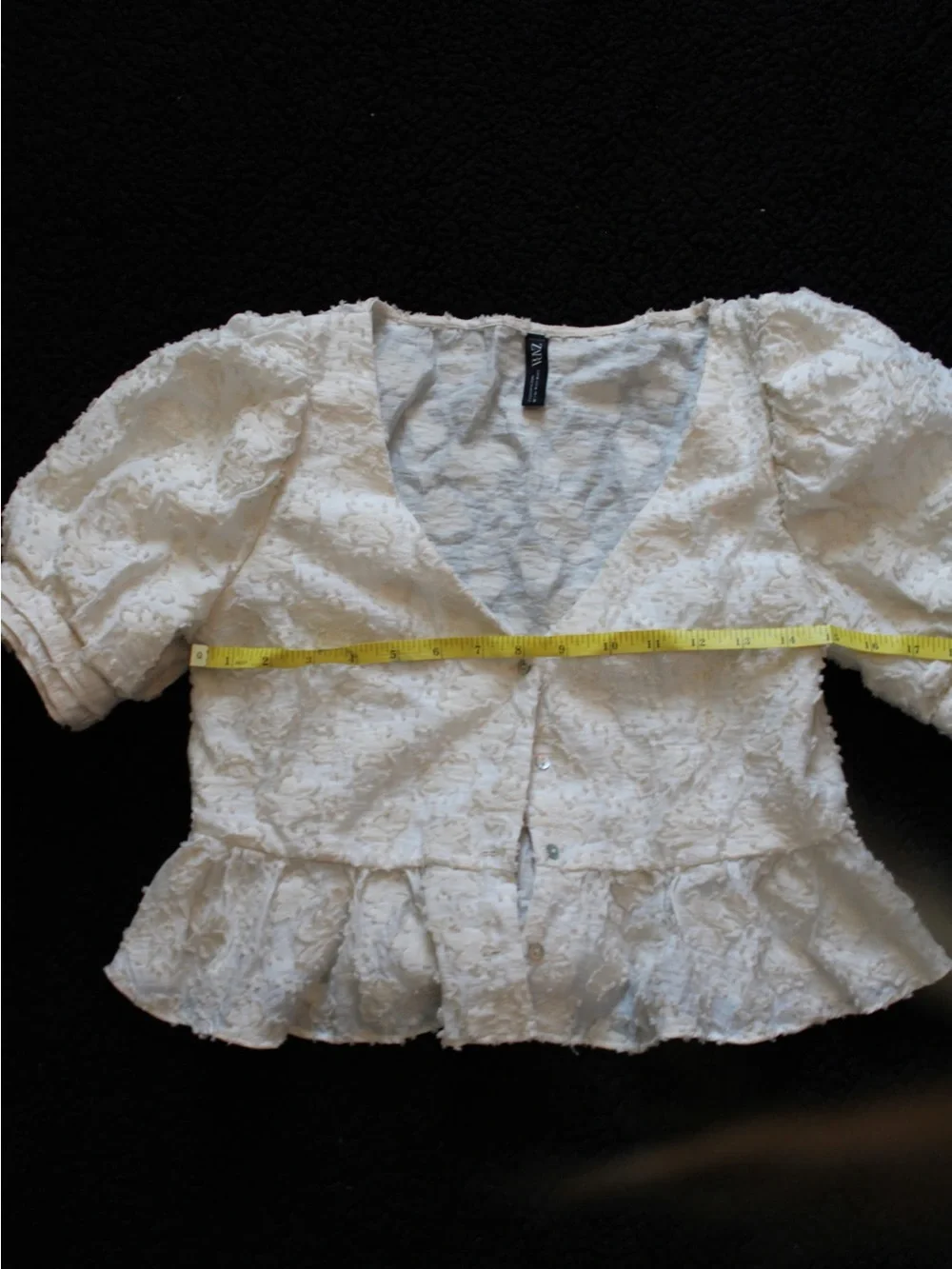 Textured Ivory Puff-Sleeve Peplum Button-Front Top